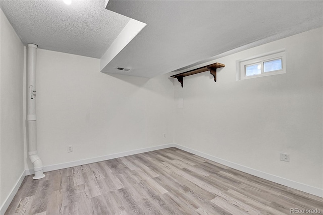 5419 E 113th Ave, Thornton, CO 80233 - spare room with light wood finished floors, a textured ceiling, and baseboards