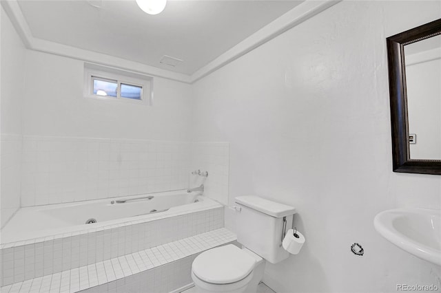 5419 E 113th Ave, Thornton, CO 80233 - full bath with toilet, a garden tub, a sink, and baseboards