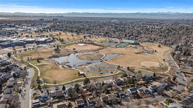 birds eye view of property with a mountain view