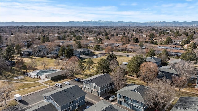 birds eye view of property with a residential view and a mountain view