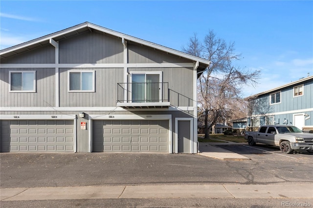 multi unit property featuring a balcony