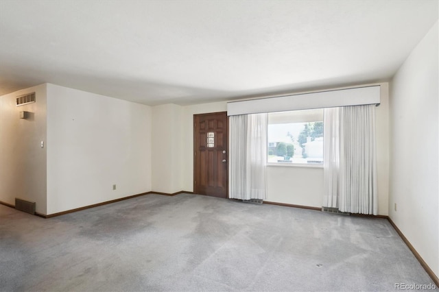 352 S Peoria Cir, Aurora, CO 80012 - empty room featuring light carpet and baseboards