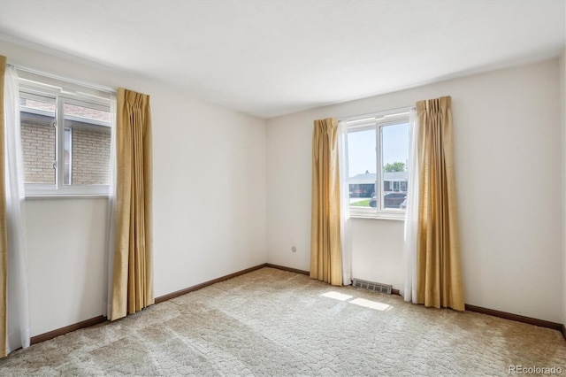 352 S Peoria Cir, Aurora, CO 80012 - carpeted empty room featuring baseboards