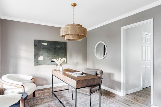 home office featuring wood-type flooring and crown molding