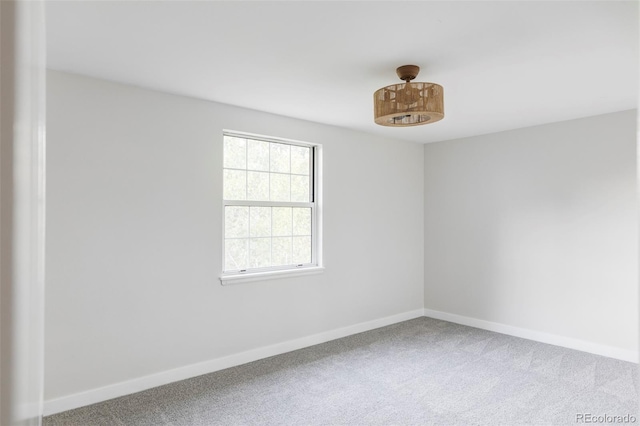 unfurnished room with carpet flooring