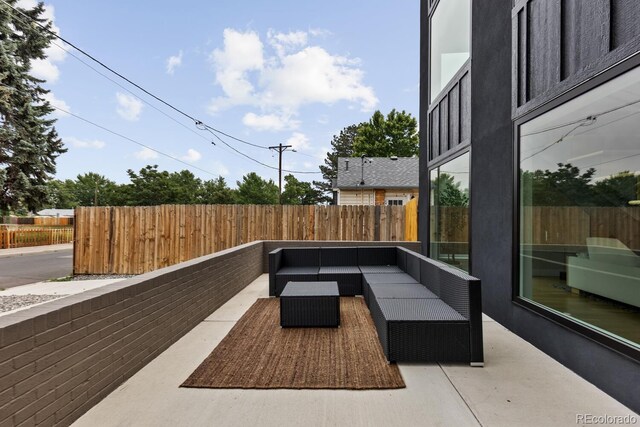 2040 W 45th Ave, Denver, CO 80211 - fenced backyard featuring an outdoor living space and a patio