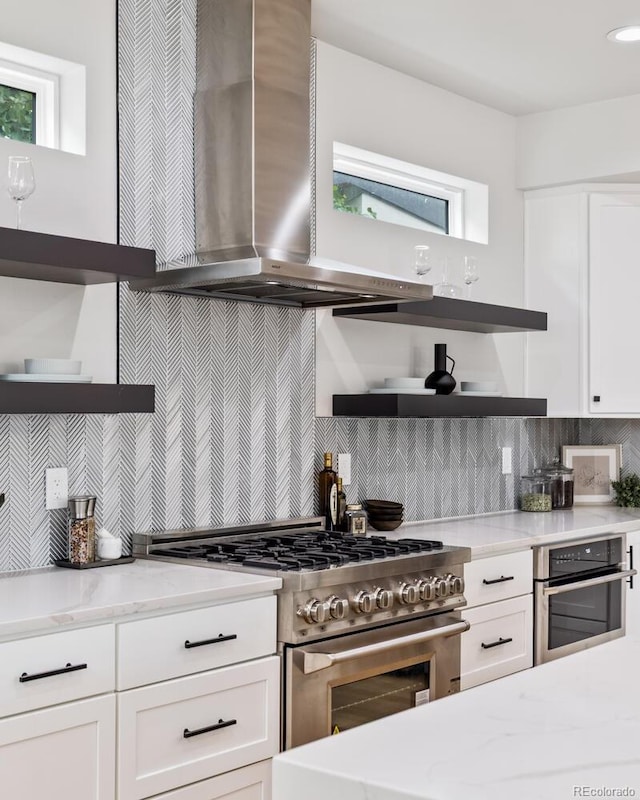 2040 W 45th Ave, Denver, CO 80211 - kitchen with open shelves, stainless steel appliances, range hood, and backsplash
