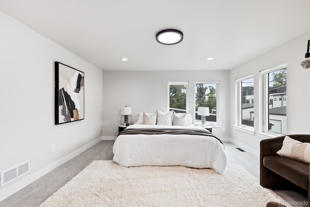 2040 W 45th Ave, Denver, CO 80211 - carpeted bedroom featuring multiple windows and recessed lighting