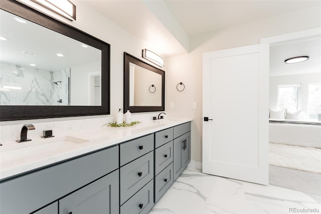 2040 W 45th Ave, Denver, CO 80211 - full bathroom featuring double vanity, marble look tiles, a marble finish shower, and recessed lighting