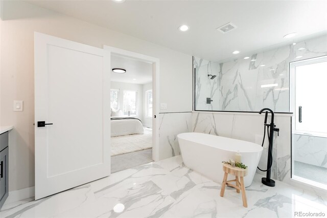 2040 W 45th Ave, Denver, CO 80211 - full bathroom with a marble finish shower, a freestanding tub, recessed lighting, vanity, and marble finish flooring