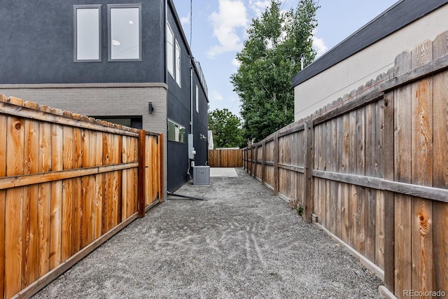 2040 W 45th Ave, Denver, CO 80211 - view of property exterior featuring a fenced backyard and brick siding
