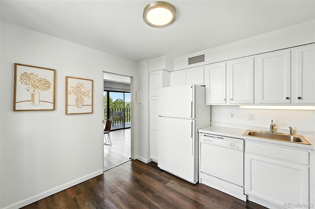 460 S Marion Pkwy Unit 801, Denver, CO 80209 - kitchen featuring white appliances, light countertops, dark wood-type flooring, and white cabinetry