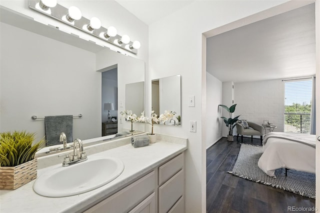 460 S Marion Pkwy Unit 801, Denver, CO 80209 - bathroom featuring vanity, wood finished floors, and ensuite bathroom
