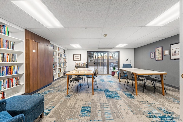 460 S Marion Pkwy Unit 801, Denver, CO 80209 - dining room featuring a paneled ceiling and built in features