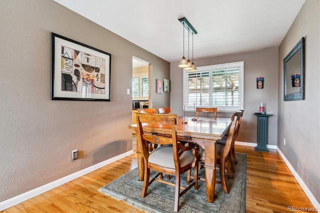 5416 S Lakeview St, Littleton, CO 80120 - dining space with light wood-style floors and baseboards