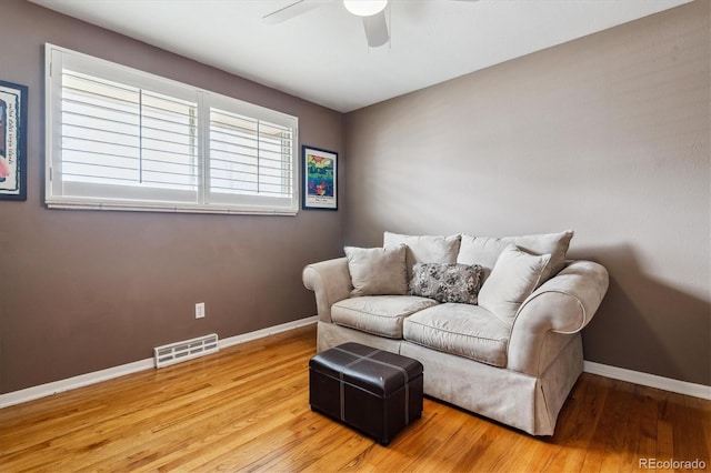 5416 S Lakeview St, Littleton, CO 80120 - living area with a ceiling fan and wood finished floors