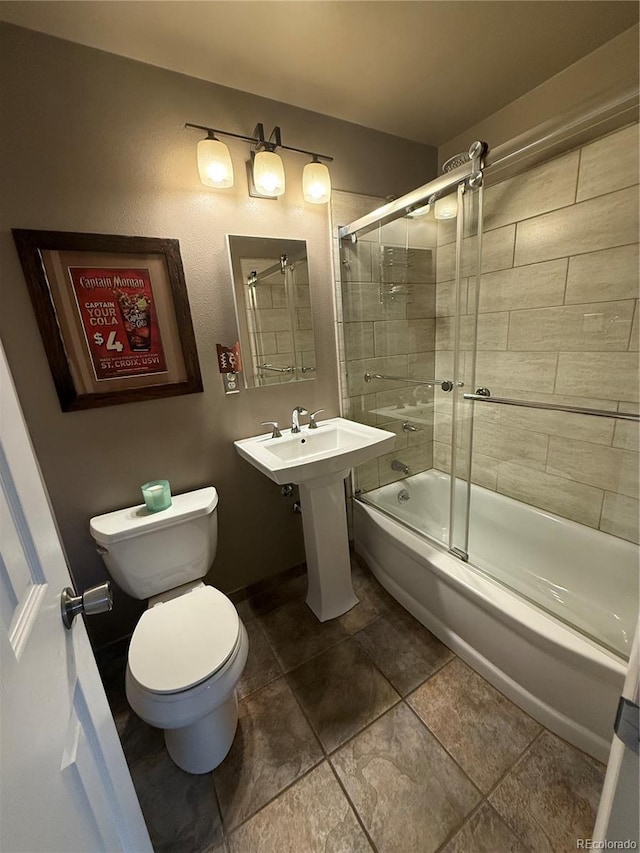 5416 S Lakeview St, Littleton, CO 80120 - bathroom with combined bath / shower with glass door and tile patterned floors