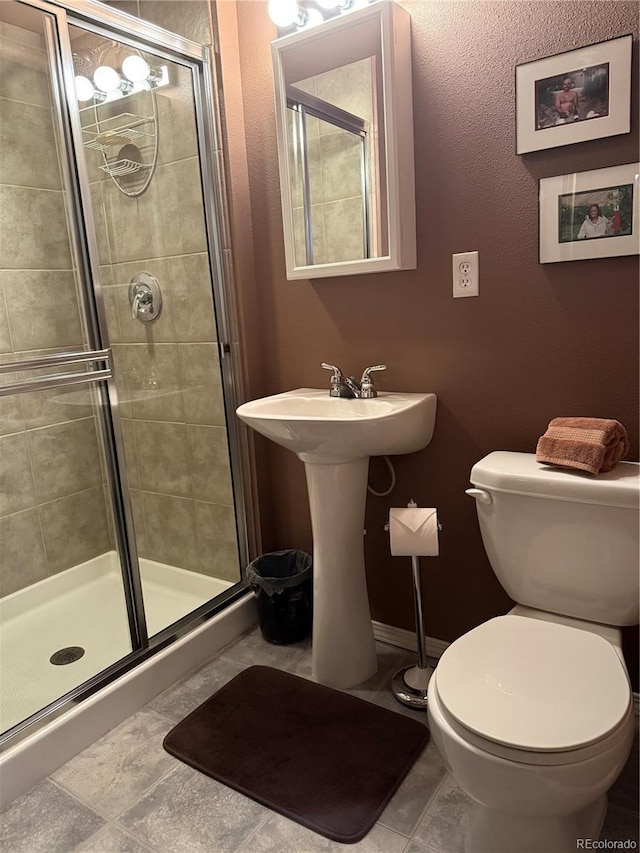5416 S Lakeview St, Littleton, CO 80120 - bathroom featuring toilet and a stall shower
