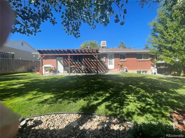 5416 S Lakeview St, Littleton, CO 80120 - back of property featuring a pergola, brick siding, entry steps, and a patio