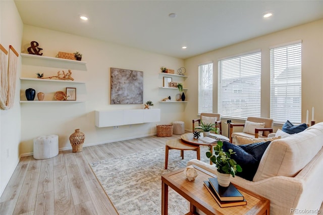 living area featuring recessed lighting and wood finished floors