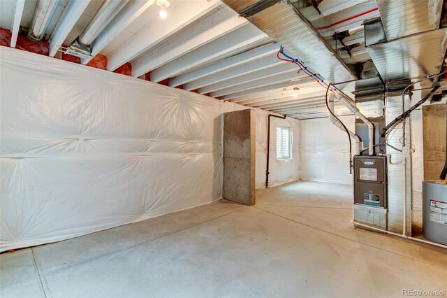 basement featuring water heater