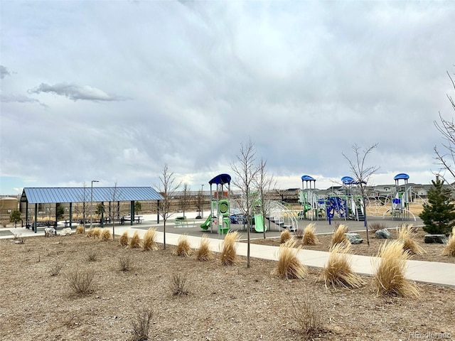 view of property's community featuring playground community