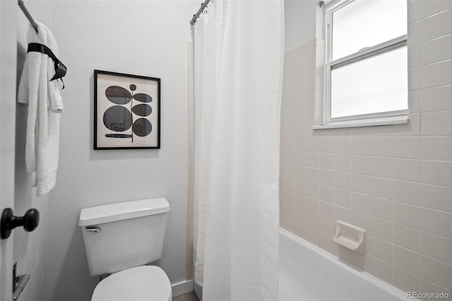 6755 S Field St Unit 625, Littleton, CO 80128 - bathroom featuring toilet and shower / tub combo