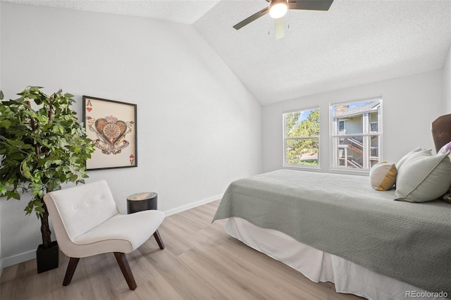 6755 S Field St Unit 625, Littleton, CO 80128 - bedroom featuring light wood-style flooring, lofted ceiling, baseboards, and ceiling fan