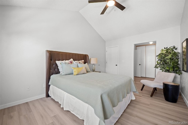 6755 S Field St Unit 625, Littleton, CO 80128 - bedroom with light wood-type flooring, a ceiling fan, baseboards, and high vaulted ceiling