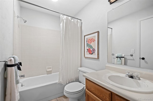 6755 S Field St Unit 625, Littleton, CO 80128 - full bath featuring toilet, shower / bathtub combination with curtain, vanity, and wood finished floors