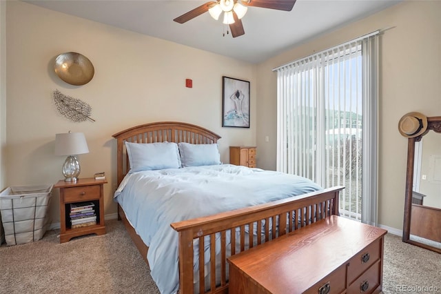 bedroom with ceiling fan and light colored carpet