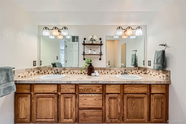 bathroom featuring double vanity, a sink, and decorative backsplash