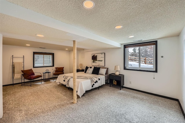 carpeted bedroom featuring a textured ceiling, recessed lighting, visible vents, and baseboards