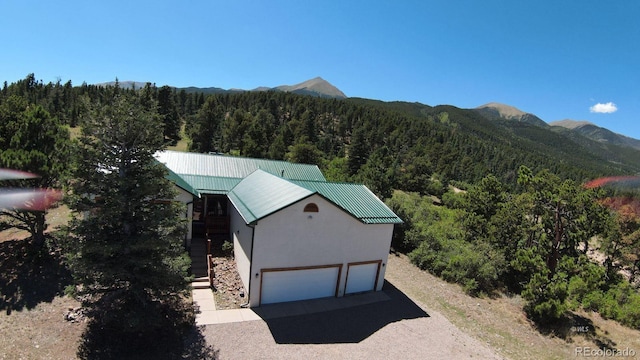 4860 County Road 140, Westcliffe, CO 81252 - view from above of property featuring a forest and a mountainous background