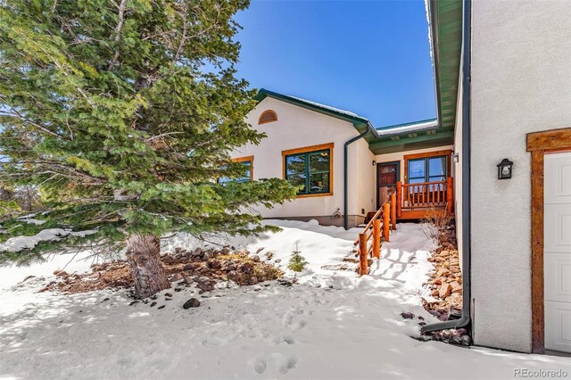 4860 County Road 140, Westcliffe, CO 81252 - view of snow covered exterior with stucco siding