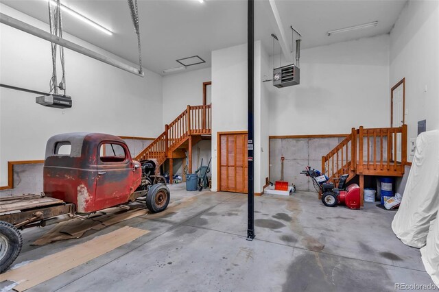 4860 County Road 140, Westcliffe, CO 81252 - garage featuring a garage door opener and a heating unit