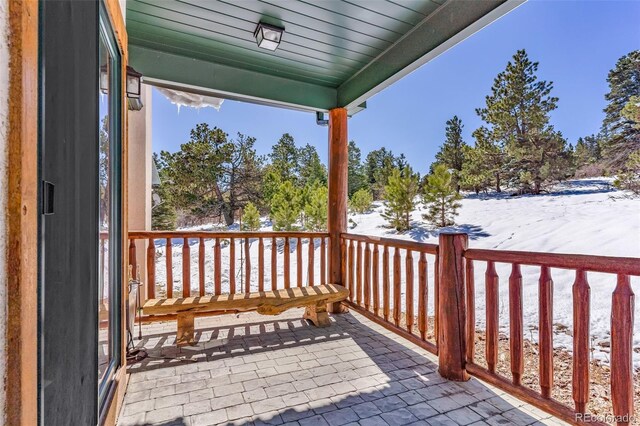 4860 County Road 140, Westcliffe, CO 81252 - snow covered deck with covered porch