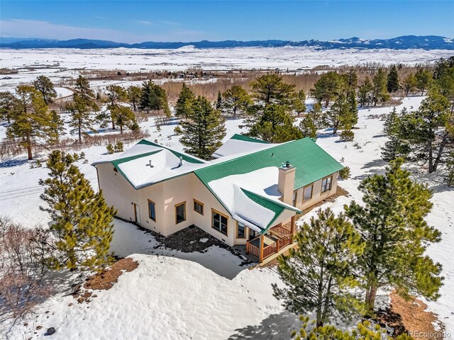 4860 County Road 140, Westcliffe, CO 81252 - snowy aerial view featuring a mountain view