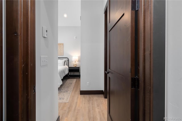 corridor featuring light hardwood / wood-style floors