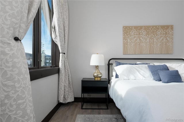 bedroom featuring hardwood / wood-style flooring