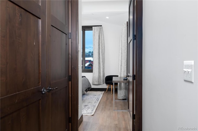 hallway featuring hardwood / wood-style floors