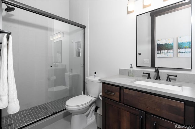 16 Springview Ln Unit A 304, Fraser, CO 80442 - full bathroom featuring toilet, a shower stall, and vanity