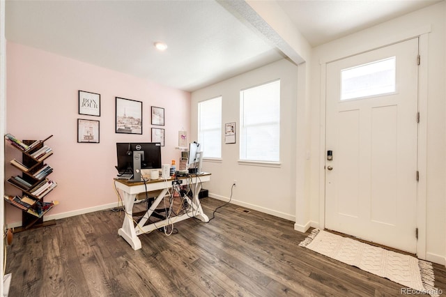 129 S Waterloo St, Aurora, CO 80018 - home office with dark wood finished floors and beam ceiling