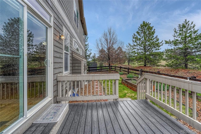 wooden deck featuring fence