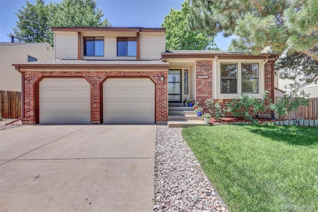 14463 E Wagon Trail Pl, Aurora, CO 80015 - view of front of home with brick siding, concrete driveway, and a garage