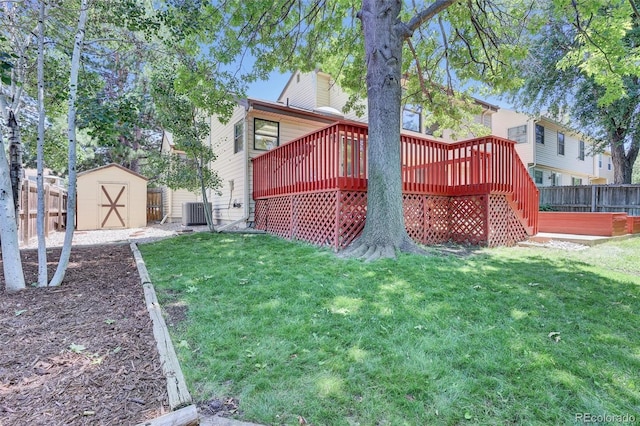 14463 E Wagon Trail Pl, Aurora, CO 80015 - rear view of house with a shed, a deck, a fenced backyard, and a chimney