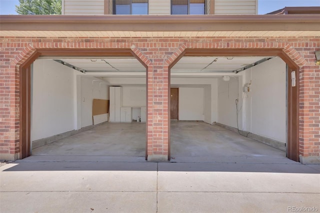 14463 E Wagon Trail Pl, Aurora, CO 80015 - garage with concrete driveway