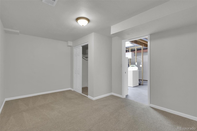 14463 E Wagon Trail Pl, Aurora, CO 80015 - unfurnished bedroom with washer / clothes dryer, carpet floors, and a closet