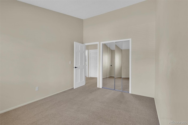 14463 E Wagon Trail Pl, Aurora, CO 80015 - unfurnished bedroom with carpet flooring and a closet