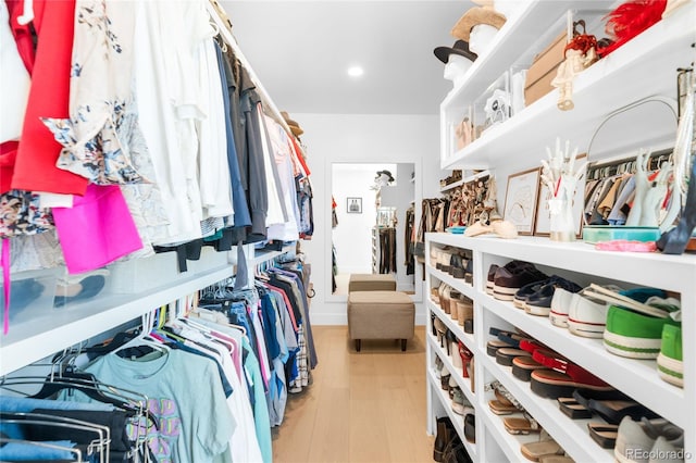 8357 W 68th Ln, Arvada, CO 80004 - walk in closet featuring light wood-style flooring